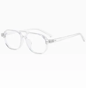 Detail view of transparent double-bridge aviator frames with high-quality hinges