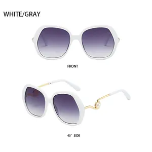 Front and 45 degree side views of white oversized sunglasses with gold pearl temples