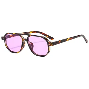 Tortoiseshell pilot sunglasses with translucent purple lenses and double bridge design