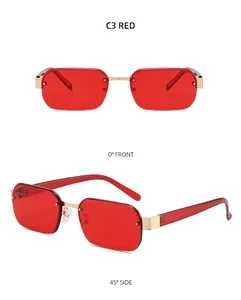 Détail des lunettes de soleil rectangulaires avec verres rouges et monture en métal doré
