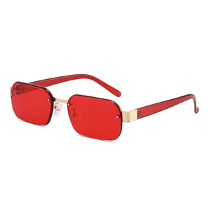 Lunettes de soleil sans monture carrées avec verres rouges et monture en métal doré