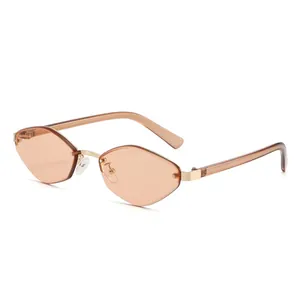 Fashionable rimless geometric sunglasses with orange tinted lenses and gold metal frame