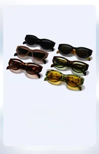 Detailed color show of cat eye sunglasses in black, tortoise, and marble finishes