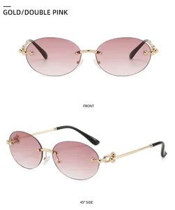 Occhiali da sole ovali senza montatura dorati con lenti sfumate rosa e catena