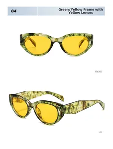 Detail of cat eye sunglasses with green marble frame and yellow transparent lenses