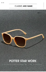 Dettaglio di occhiali da sole quadrati color champagne con accenti metallici e lenti sfumate