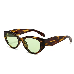Chic cat-eye sunglasses with tortoiseshell frames and green lenses for women