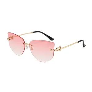 Chic rimless polygon sunglasses with pink gradient lenses and gold chain metal temples