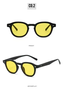 Front and 45-degree views of retro round black frame sunglasses with yellow lenses