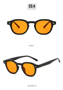 Front and 45-degree views of retro round black glasses with amber lenses