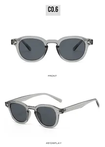 Front and 45-degree views of translucent gray round sunglasses with silver rivets