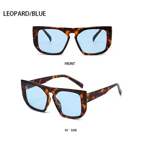 Detail view of square leopard sunglasses with blue lenses in front and side perspectives