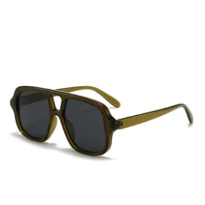 Classic double bridge aviator sunglasses with translucent olive green frames and dark lenses