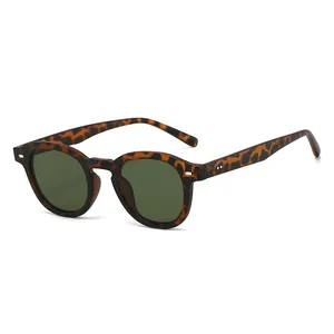 Retro round leopard print sunglasses with dark green lenses and silver metal rivets