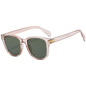 Occhiali da sole vintage oversize con montatura arancione rosa e lenti verde scuro