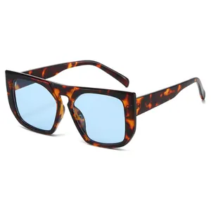 Retro square oversized sunglasses with tortoise shell frames and light blue tinted lenses