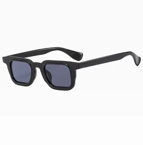 Close-up of black rectangular sunglasses featuring thick frames and anti-slip temple tips