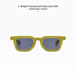 Detail view of mustard yellow rectangular sunglasses with transparent smoke lenses C04