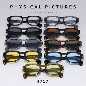 Matrix display of multi-colored polygonal frame sunglasses showing diverse lens and frame tints
