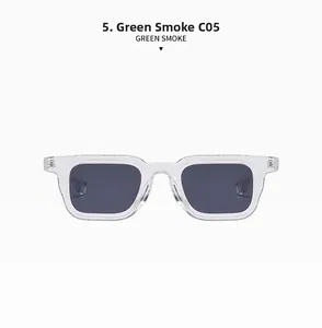 Detail view of transparent C05 frame sunglasses with green smoke lenses and high-end texture