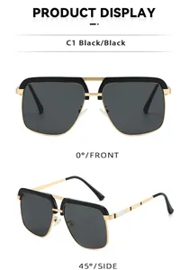 Detail view of vintage double bridge metal sunglasses with black lenses and gold trim