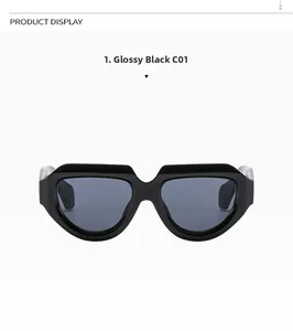 Close-up of bright black geometric square sunglasses with metallic silver temple accents
