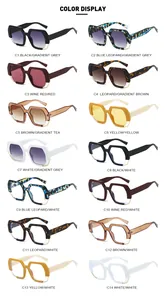 Matrix display of hexagonal sunglasses in 14 colors showing various gradient lenses
