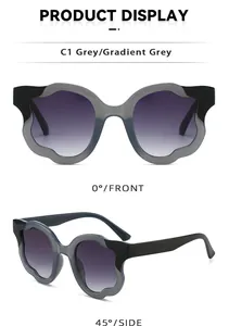 Detail view of wavy frame sunglasses with gradient grey lenses from front and side angles