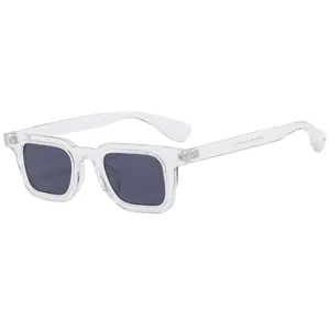Modern transparent square frame sunglasses with dark lenses from a 45-degree angle