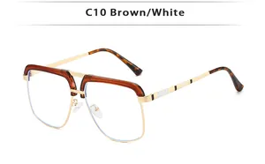 Detail view of double bridge metal frames with brown flat top and tortoiseshell tips