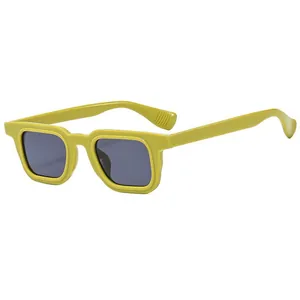 Modern square frame sunglasses with yellow mustard frames and dark grey UV lenses