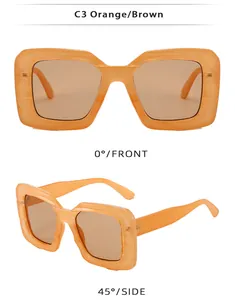 Detailed front and 45-degree side view of orange oversized square sunglasses with brown lenses