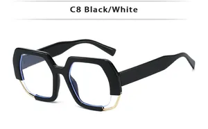 Detailed side view of bold geometric eyewear frame with sleek black finish and gold accents