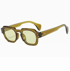 Macro detail of amber translucent frame sunglasses with yellow lenses and CE marks