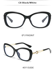 Vue détaillée de lunettes noires avec charnière dorée en forme de nœud métallique chic