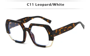 Close-up of leopard pattern frames with gold metal trim on retro fashion sunglasses