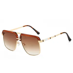 Men's vintage pilot sunglasses with gold metal frame and brown gradient lenses