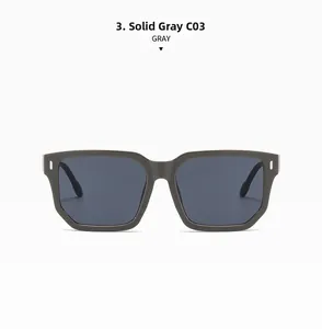 Vue détaillée des lunettes de soleil carrées gris uni avec rivets argentés et verres teintés