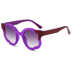 Trendy wave-shaped purple sunglasses with burgundy temples and gradient lenses