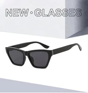 Detail of trendy black square frame sunglasses placed on a minimalist geometric pedestal