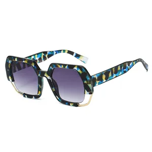 Chic hexagonal oversized sunglasses with blue tortoise frames and purple gradient lenses