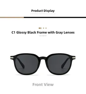 Front view of oval black sunglasses with silver hinge accents and dark grey lenses