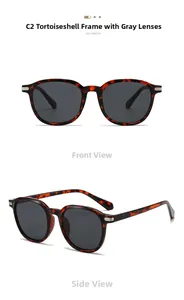 Close-up of retro tortoiseshell oval sunglasses with vintage metal stripe temple details