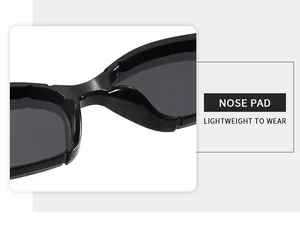 Detail of integrated nose pads on black cat-eye sunglasses for lightweight comfort