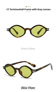 Detail of vintage oval tortoiseshell sunglasses with light green lenses and silver accents