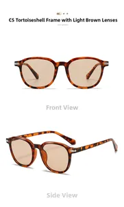Detail view of retro oval sunglasses with tortoiseshell frames and light brown lenses