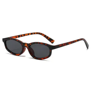 Retro oval tortoiseshell sunglasses with dark lenses for women, stylish vintage frames