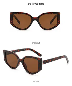 Détail de lunettes de soleil œil de chat léopard tendance avec des verres marron chic