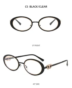 Detail view of retro oval sunglasses with metal trim and hollow heart temple design