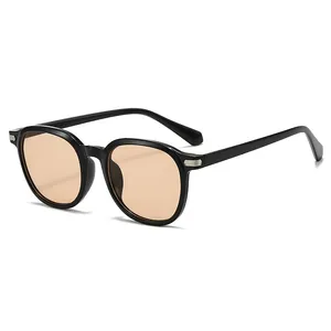 Retro oval sunglasses with black frames and light brown lenses at a 45-degree angle view